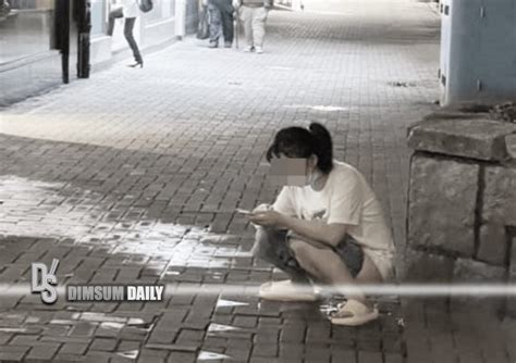 Woman Plays With Mobile Phone While Urinating In Public On Sai Wan Ho