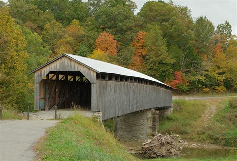 Covered bridge, covered with fall colors Photograph by Tammy Sullivan ...