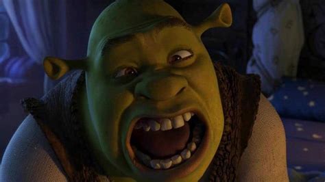 An Animated Green Man With His Mouth Open And Teeth Wide Open In A Scene From The Animated