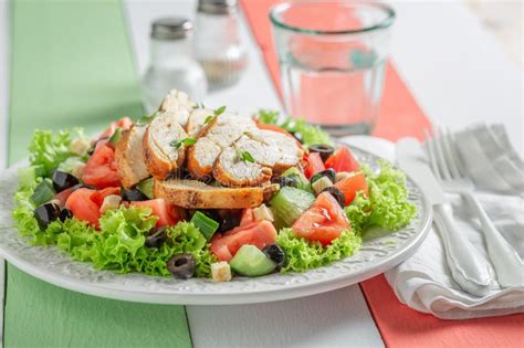 Healthy And Classic Caesar Salad With Cucumber Chicken And Tomatoes