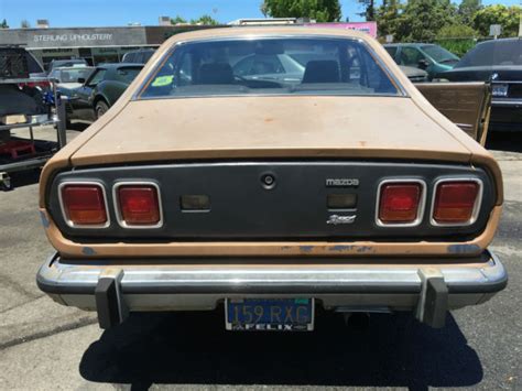 Seller Of Classic Cars 1976 Mazda Rx4 Goldbrown