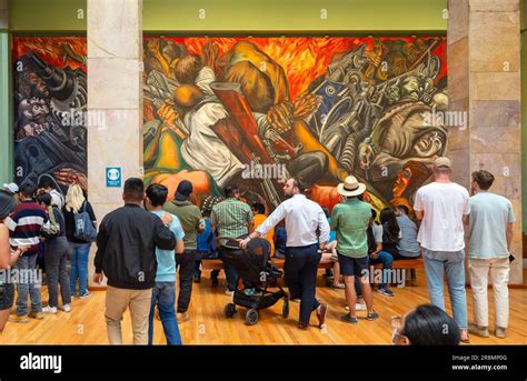 People Viewing Katharsis Mural By Jose Clemente Orozco Palacio