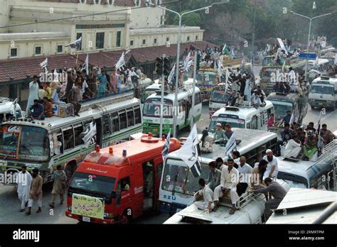 Pakistani People Attend A Rally Against The Israeli Air Strike On The