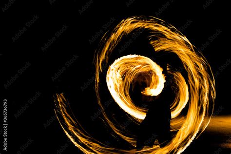 Amazing traditional fire dancing show at night in Thailand Stock Photo ...