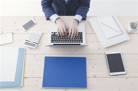 premium photo office worker typing   laptop