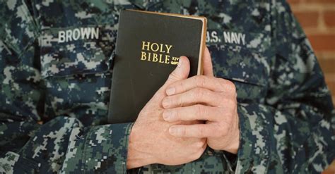 Video Of Us Navy Soldier Holding Bible · Free Stock Video