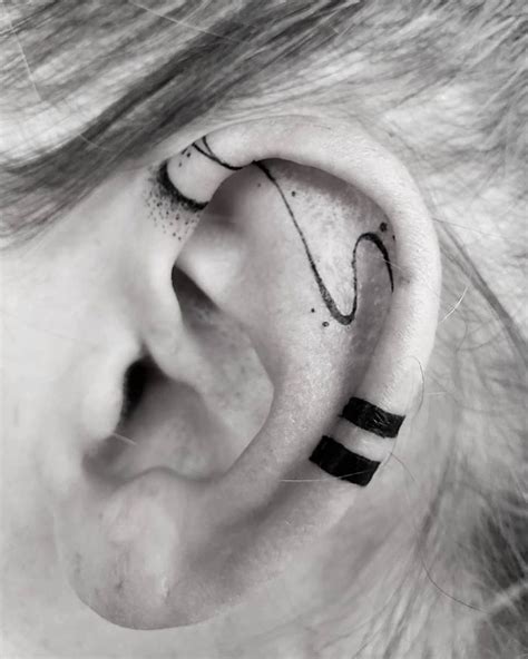 Stylish Ear Lobe Tattoo - Tattoo Designs for Women