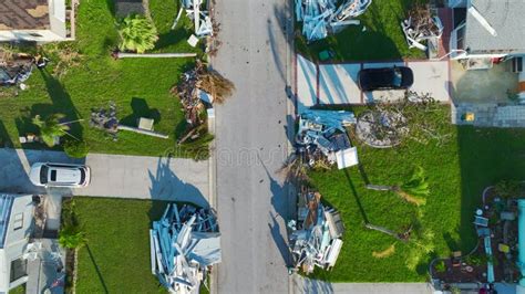 Heaps Of Debris Rubbish On Street Side Near Severely Damaged By