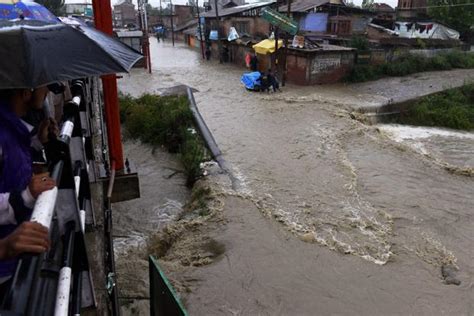 Flash Floods Hit Lolab Woman Killed Houses Crops Damaged Foot