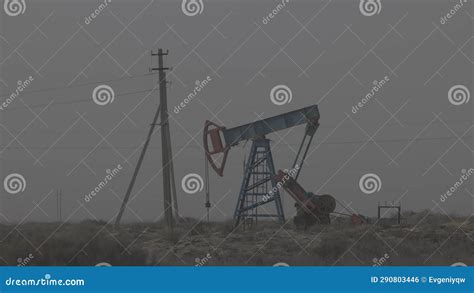 Oil Industry Pumping Petroleum Rig In Desert Pump Jack Extracting