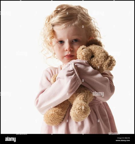 Young Girl Holding Teddy Bear Stock Photo Alamy