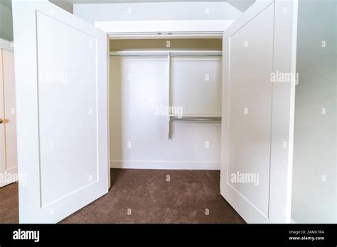 Empty Interior Of An Open White Closet Stock Photo Alamy