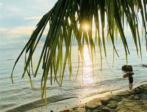 Alubijid Misamis Oriental Shoreline And Mountains Peakd