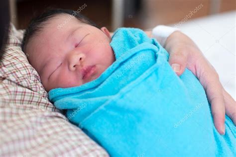 Newborn Baby Girl And Mother Stock Photo By ©szefei 31671653