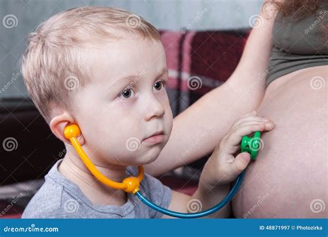 Son Plays With Pregnant Mom Stock Image Image Of Medicine Belly