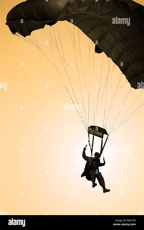 Soldier Descending On Parachute Stock Photo Alamy