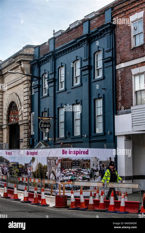 The Zizzi Restaurant In Salisbury Cordoned Off With A Police Guard