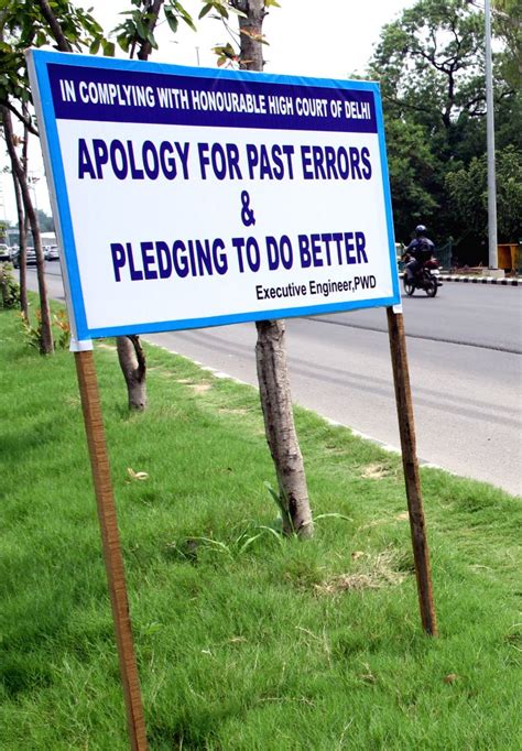 An 'apologies signage board' put up by the PWD, expressing regret