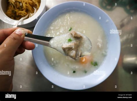 Eating Rice Gruel Rice Porridge Or Congee Dish Stock Photo Alamy