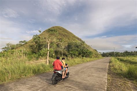Sagbayan Bohol Philippines A Motorcycle Passes By On A Concrete