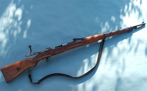 sword  musket mauser   riflesold