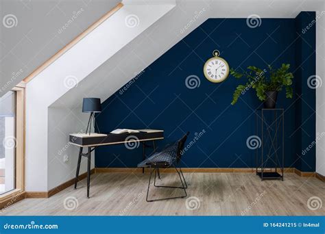 Home office with blue wall stock image. Image of chair - 164241215