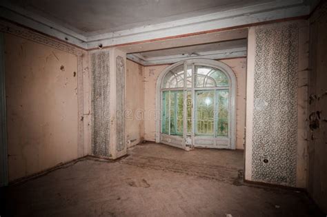 Abandoned Elegance A Forgotten Room With Overgrown Views Stock Photo