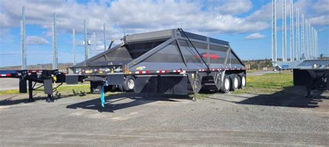 How Many Tons Can A Tri Axle Dump Truck Carry