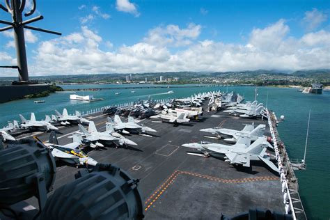 Photo Of The Day Aircraft Carrier With Dozens Of Aircraft On Deck Pulls Into Pearl Harbor