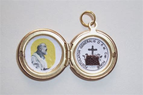 Mystics Of The Church How The St Padre Pio Relic Locket Rosary Is Made