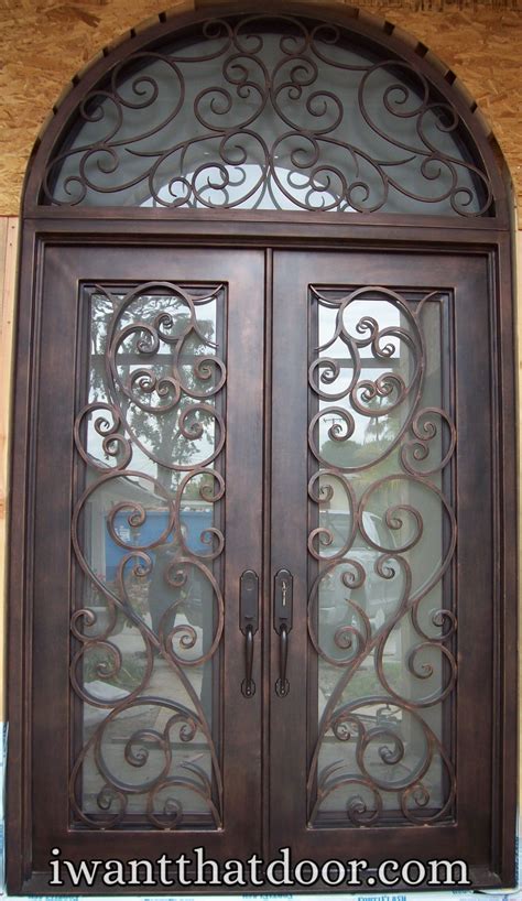 Wrought Iron Double Entry Door With A Transom Designed And Manufactured