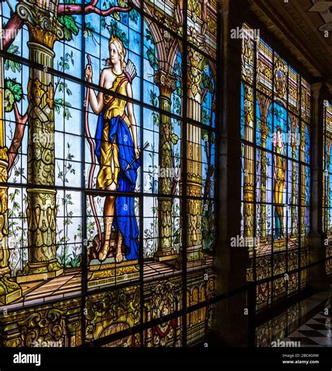 Hallway lined with ornate stain glass murals, at Chapultepec Castle, in Mexico City. Now known ...