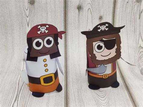 Two Paper Dolls Made To Look Like Pirates