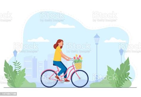 Cute Girl Rides A Bicycle In A Park Outside The City Young Woman On A