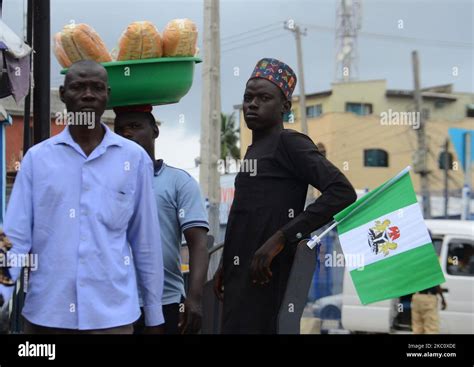 Pass By Walk Past Nigerian Flag At Allen Roundabout In Ikeja Ahead Of