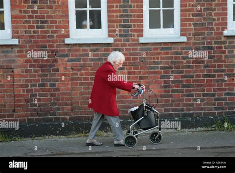 Old Woman Shopping Pushing Trolley Hi Res Stock Photography And Images