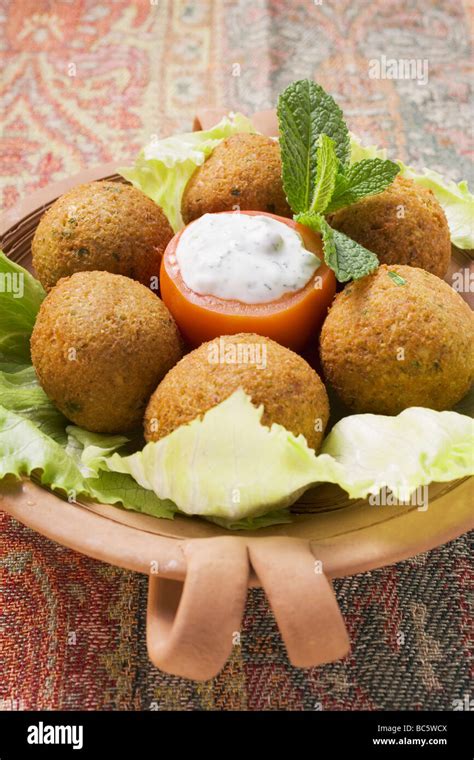 Falafel Chick Pea Balls With Stuffed Tomato Stock Photo Alamy