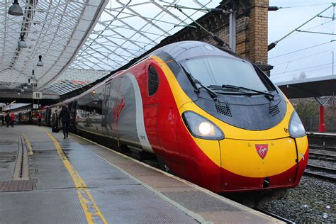 390123 Virgin Trains Class 390 Pendolino 390123 Sits At Cr Flickr