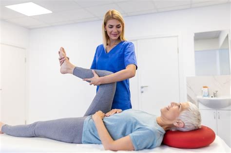 Premium Photo Physiotherapist Working With Patient In Clinic Closeup