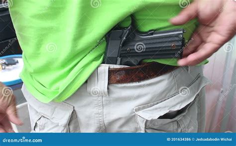 Gangster Concealing His Gun Behind His Back Stock Footage Video Of