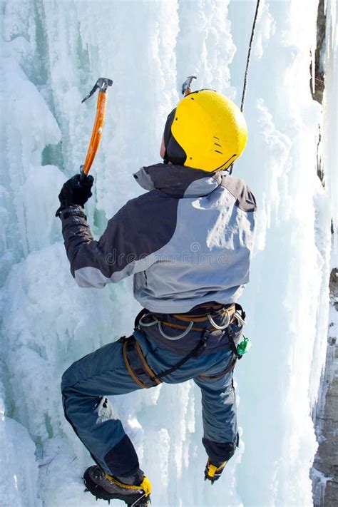 Man Climbing Frozen Waterfall Stock Image Image Of Landscape Cold