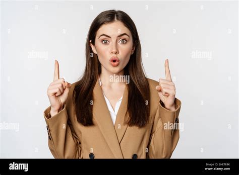 Portrait Of Female Entrepreneur Corporate Woman Pointing Fingers Up