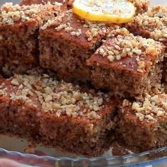 A Close Up Of A Plate Of Food With Some Type Of Cake On Top Of It