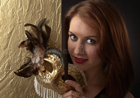 Young Beautiful Woman With Golden Carnival Mask Stock Photo Image Of