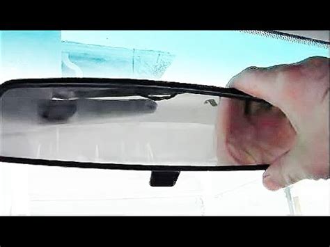 how to put a rear view mirror back on