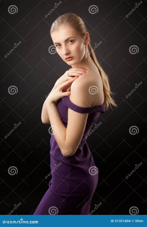 Blonde Girl In Purple Dress Stock Photo Image Of Blond Pose 31321604