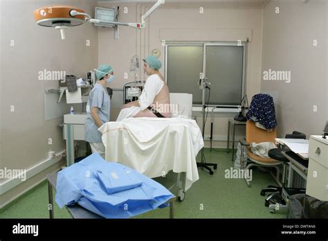 Pregnant woman epidural Stock Photo - Alamy