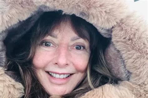 Carol Vorderman Puts On A Very Busty Display In A Tiny Welsh Dragon Bikini For Throwback