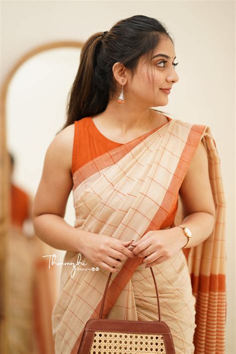 Women Beige And Orange Checked Silk Cotton Saree