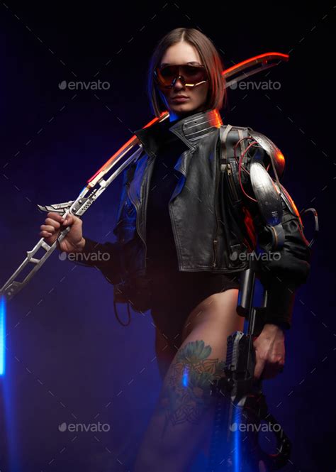 Sexy Female Killer With Nude And Tattooed Leg In Dark Background Stock Photo By Fxquadro